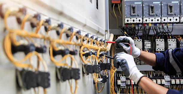 Professional Electrician technician working in Peabody, KS